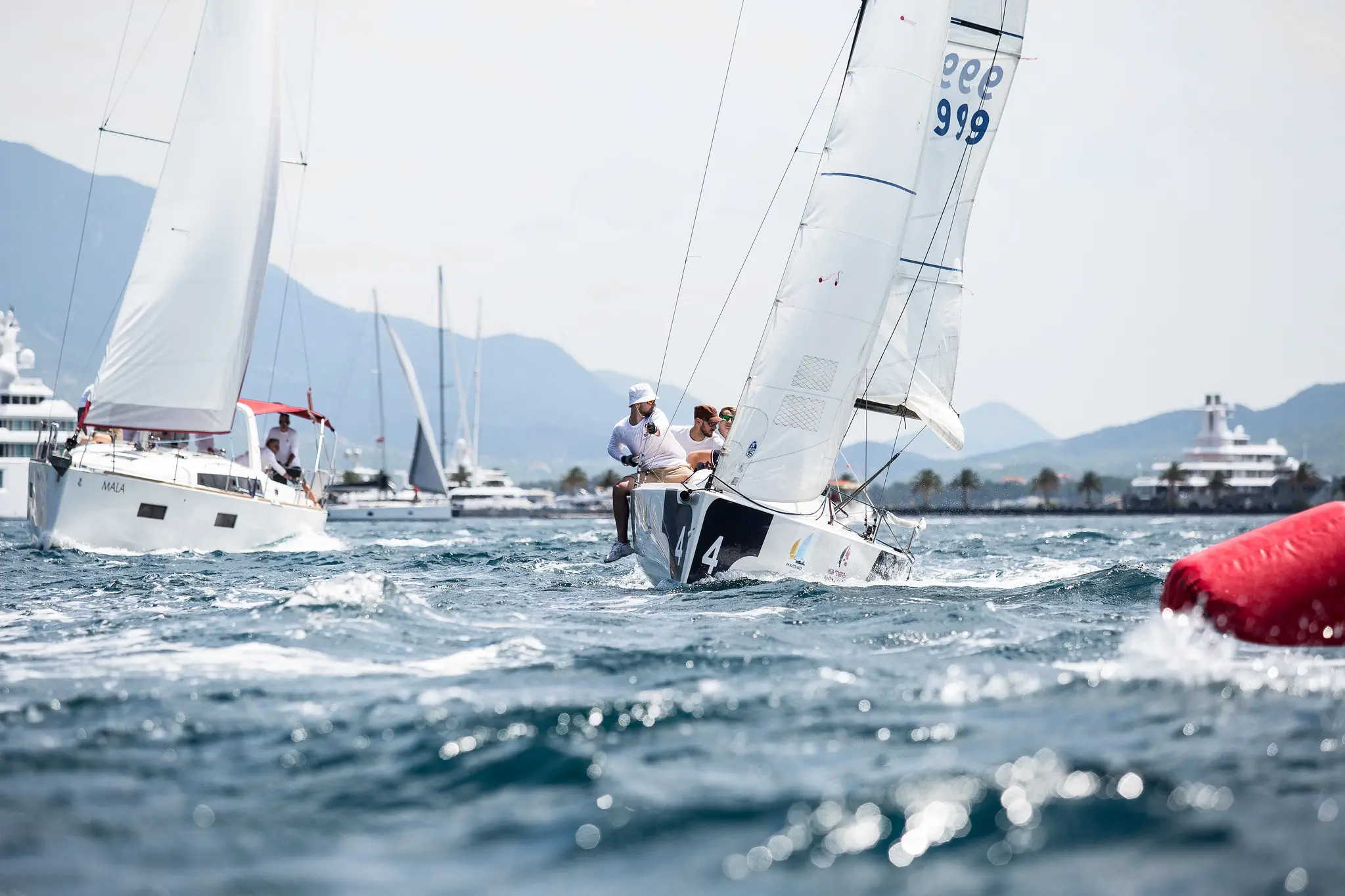 sailing boat reaches the finish target